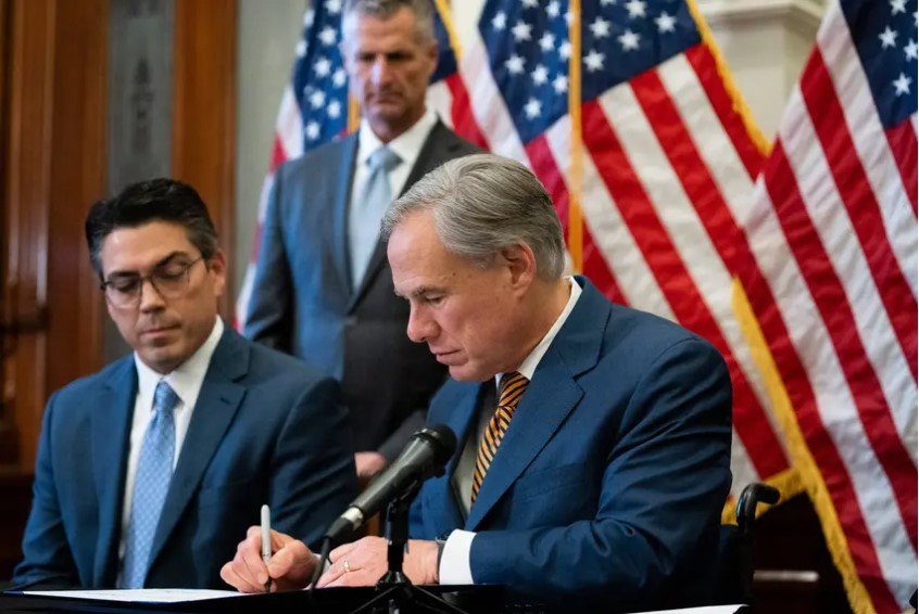 Gov. Greg Abbott signed Senate Bills 2 and 3 at the Texas Capitol on Tuesday. The legislation will change how parts of the state’s main power grid must prepare for extreme weather and the governance of the entity that oversees the grid. Senate Bills 2 and 3 are aimed at overhauling the state’s power grid after the devastating winter storm in February and the widespread power outages that followed.